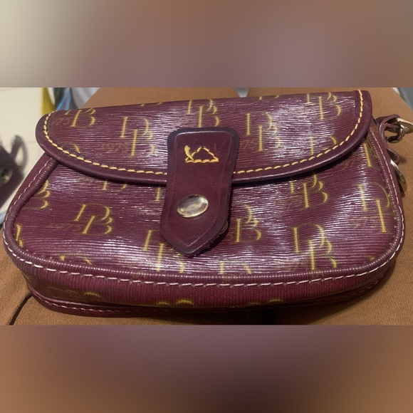Dooney & Bourke Burgundy Signature
Leather & Canvas Flap Wristlet - Picture 2 of 8